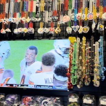 Bourbon Street - a television screen with a picture of a football player on it - Sports Bars Near Me - Carson City, Nevada