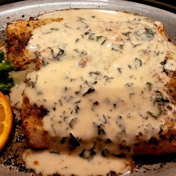 The Fish House - Mahi Mahi Hemingway style Lightly breaded with Italian breadcrumbs and baked, topped with a white wine, garlic, basil cream sauce. - Seafood Near Me - Key Largo, Florida The Fish House - Mahi Mahi Hemingway style Lightly breaded with Italian breadcrumbs and baked, topped with a white wine, garlic, basil cream sauce. - Seafood Near Me - Key Largo, Florida