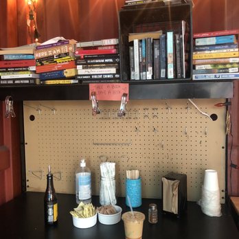 Til Death - a cluttered desk with books and drinks - Coffee & Tea Near Me - Brooklyn, New York Til Death - a cluttered desk with books and drinks - Coffee & Tea Near Me - Brooklyn, New York