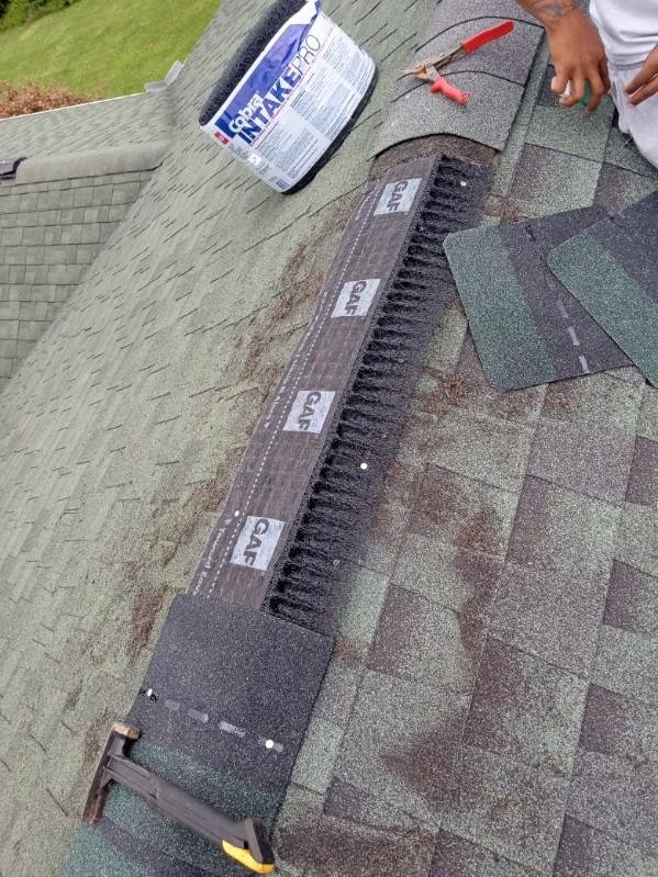 Slide of All Slopes Roofing