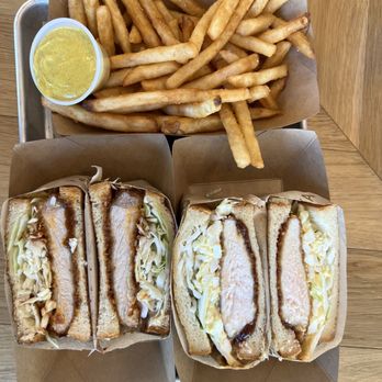 Tanaka - Spicy Pork Katsu (left), Chicken Katsu (right), and Fries (top) with curry aioli - Sandwiches Near Me - Portland, Oregon Tanaka - Spicy Pork Katsu (left), Chicken Katsu (right), and Fries (top) with curry aioli - Sandwiches Near Me - Portland, Oregon