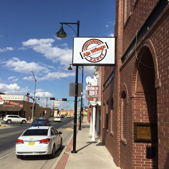 AJ's Wings - a car parked on the side of the road - Chicken Wings Near Me - Portales, New Mexico