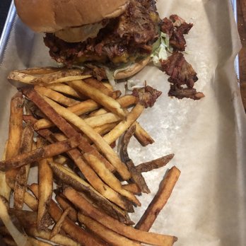 The Rusty Nail - Hand-Cut French Fries, Burger with pulled pork and onion ring - Sports Bars Near Me - Omaha, Nebraska The Rusty Nail - Hand-Cut French Fries, Burger with pulled pork and onion ring - Sports Bars Near Me - Omaha, Nebraska