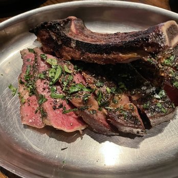 Rec Pier Chop House - Bone-in, dry-aged ribeye cooked medium rare - Steakhouses Near Me - Baltimore, Maryland Rec Pier Chop House - Bone-in, dry-aged ribeye cooked medium rare - Steakhouses Near Me - Baltimore, Maryland