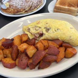 Meat Lovers Omelet and Home Fries.