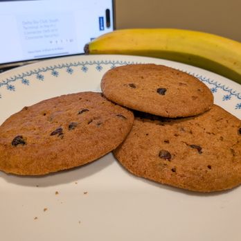 Delta Airlines - Chocolate chip cookies and a banana from the Delta Sky Club at Miami International Airport, South Terminal, Concourse H (and J). - Airlines Near Me - Miami, Florida Delta Airlines - Chocolate chip cookies and a banana from the Delta Sky Club at Miami International Airport, South Terminal, Concourse H (and J). - Airlines Near Me - Miami, Florida