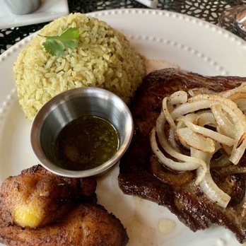 Rumba - Churrasco - grilled skirt steak w chimmichurri. Sides: cilantro rice and maduros (sweet plantain) - Latin American Near Me - Colorado Springs, Colorado Rumba - Churrasco - grilled skirt steak w chimmichurri. Sides: cilantro rice and maduros (sweet plantain) - Latin American Near Me - Colorado Springs, Colorado