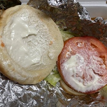 Cook Out - a sandwich with a tomato and lettuce - Fast Food Near Me - Knoxville, Tennessee