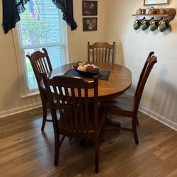 Pleasant View Furniture - Custom kitchen table and chairs in rift and quarter sawn white oak with three (3) self-storable leaves