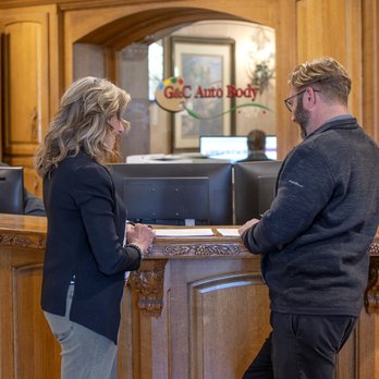G&C Auto Body - Estimator reviewing quote with customer - Body Shops Near Me - Modesto, California G&C Auto Body - Estimator reviewing quote with customer - Body Shops Near Me - Modesto, California