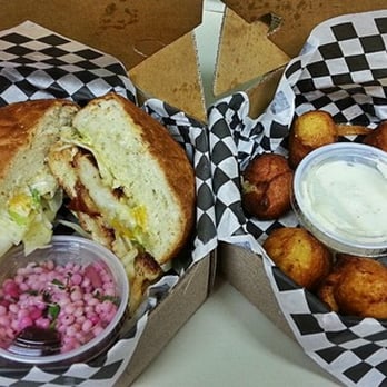 Grégoire - Sauteed scallop patty, proscuitto, and orange-fennel slaw sandwich with potato puffs - French Near Me - Berkeley, California