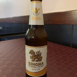 a bottle of beer on a table