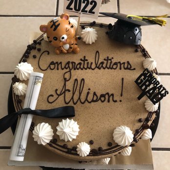 Little Flower - Awesome cake.  We added the tiger and the graduation stuff.  They personalized and added the meringues - Candy Stores Near Me - Pasadena, California