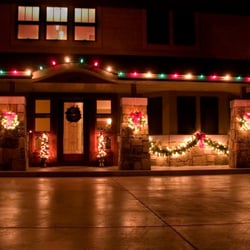 Naylor Landscape Management - Christmas Decor - multi-color LED lights. Roof lighting, garland and wreaths. Kalamazoo, MI