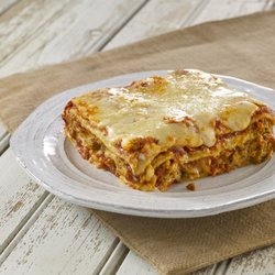 Swiss Farm Stores - Meat Lasagna
Layers of pasta filled with ricotta and mozzarella, and ground beef marinara