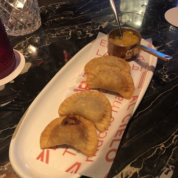 MAD - empanadillas de cochinillo (suckling pig, potato, onion, mango-apricot chutney) - Spanish Near Me - Houston, Texas
