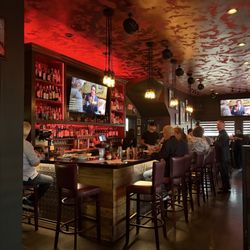 Santino's Little Italy - Cozy atmosphere, Bar seating and old movie playing