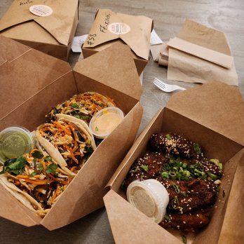 Korea Taqueria - South Philly - two take out boxes of food - Korean Near Me - Philadelphia, Pennsylvania Korea Taqueria - South Philly - two take out boxes of food - Korean Near Me - Philadelphia, Pennsylvania