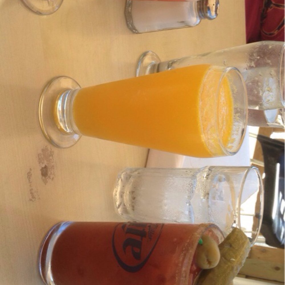 Nosh - L to R: mango mimosa, traditional mimosa, and Bloody Mary - New American Near Me - Geneva, Illinois Nosh - L to R: mango mimosa, traditional mimosa, and Bloody Mary - New American Near Me - Geneva, Illinois