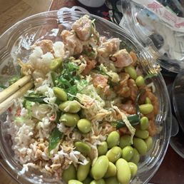 Poke bowl with weird tuna, suspicious salmon, and a tablespoon of dried out crab... Poke bowl with weird tuna, suspicious salmon, and a tablespoon of dried out crab...
