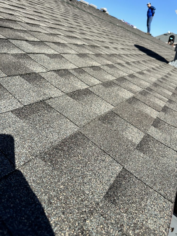 Slide of Taylored Roofing