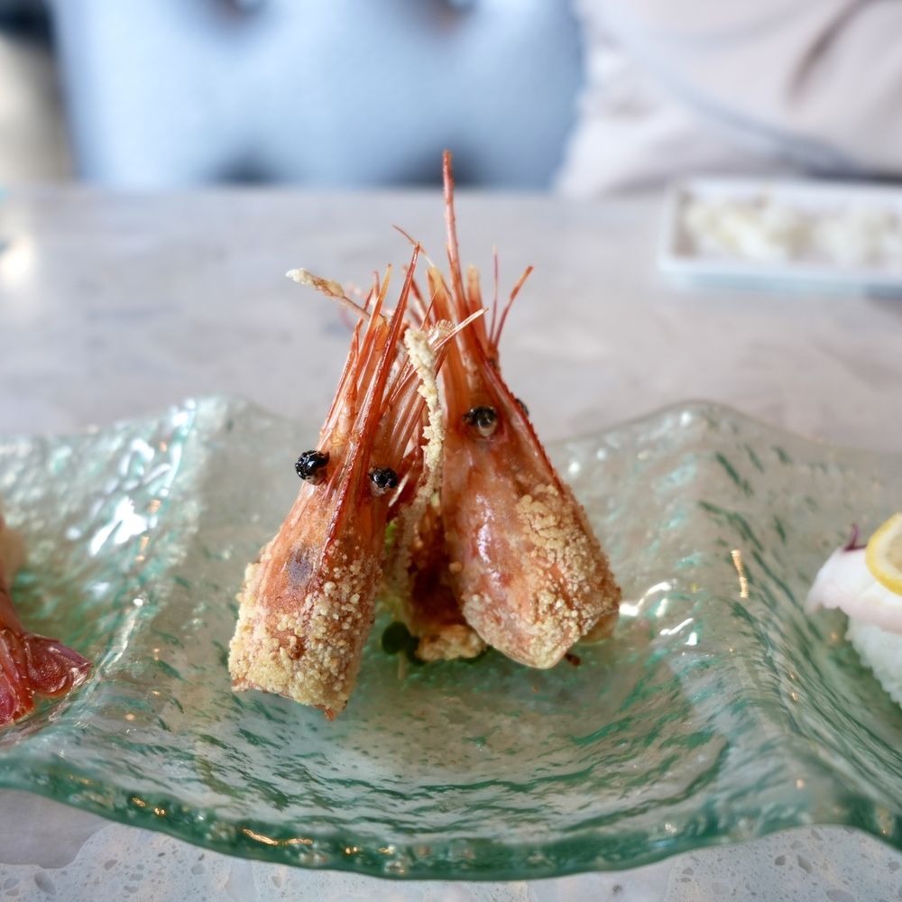 Amici Sushi - Amaebi with fried shrimp head (served with ponzu sauce) and tako on the right - Sushi Bars Near Me - Lathrop, California Amici Sushi - Amaebi with fried shrimp head (served with ponzu sauce) and tako on the right - Sushi Bars Near Me - Lathrop, California
