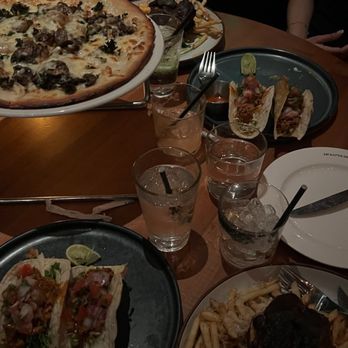 Earls Kitchen + Bar - We got  - Blackened Cajun Chicken Dinner for Two - Yucatan Chicken Tacos - Mushroom pizza - New American Near Me - Bellevue, Washington