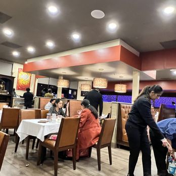 Chaat Bhavan - a waitress serving customers - Indian Near Me - Fremont, California Chaat Bhavan - a waitress serving customers - Indian Near Me - Fremont, California