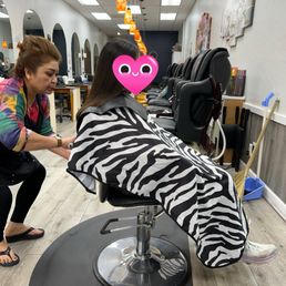 Kathy , the hair stylist gave my girl a  hair cut .