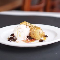 Banana fritter with vanilla ice cream