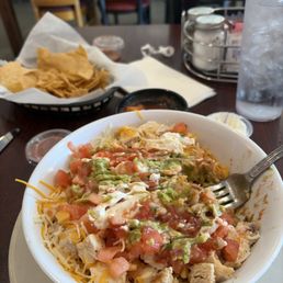 Bowl/ rice,beans, chicken, cabbage, cheese, guacamole . Bowl/ rice,beans, chicken, cabbage, cheese, guacamole .