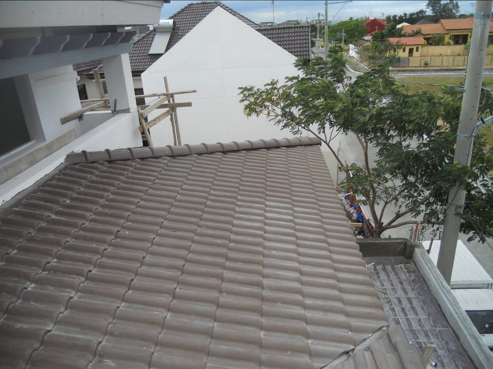 Slide of Progressive Roofing