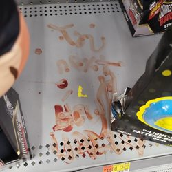 Walmart Supercenter - Some lovely fingerpainting (blood?) done in the toy aisle