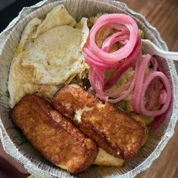 Mangú platter with extra onions- no salami (extra cheese was added instead)
