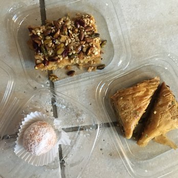 Queen of Mediterranean - Baklava, polenta cake with nuts, and a carrot/coconut dessert ball - Mediterranean Near Me - Lenexa, Kansas Queen of Mediterranean - Baklava, polenta cake with nuts, and a carrot/coconut dessert ball - Mediterranean Near Me - Lenexa, Kansas
