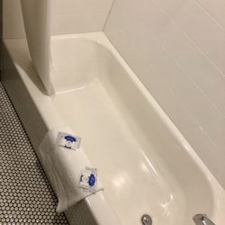 Economy Inn - Sparkling clean tub & floors. Everything is brand new in May 2018.