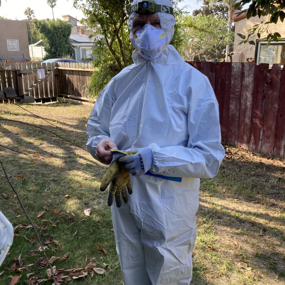 BugMizer Termite and Pest - Suited up to crawl deep under house. - Pest Control Near Me - San Diego, California
