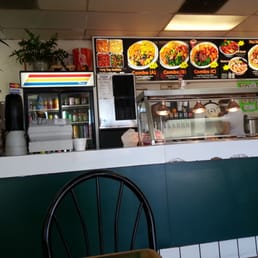 a view of a restaurant counter