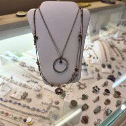 Sea of Silver - A collection of necklaces and rings.