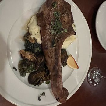 Mazi - Pork chop with mashed potatoes and roasted Brussel Sprouts. - New American Near Me - Washington, DC, District of Columbia Mazi - Pork chop with mashed potatoes and roasted Brussel Sprouts. - New American Near Me - Washington, DC, District of Columbia