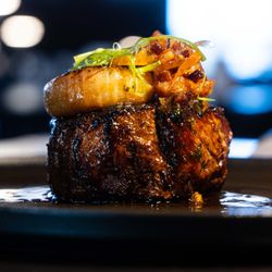 Driven Steakhouse - 14oz. Cab eye of ribeye steak. Served with cipollini onion, and bacon jam.