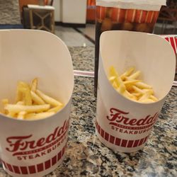 Freddy's Frozen Custard & Steakburgers - Half full fries