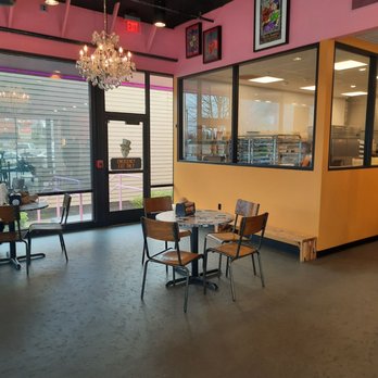 Voodoo Doughnut - Inside seating area...only 2 tables - Donuts Near Me - Vancouver, Washington