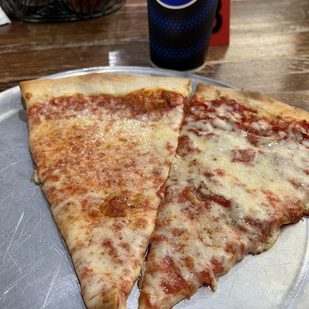 Two Cheese Slices & a Fountain Soda Lunch Special served until 3p