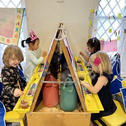 St. Paul's Nursery School - Painting at the easels!