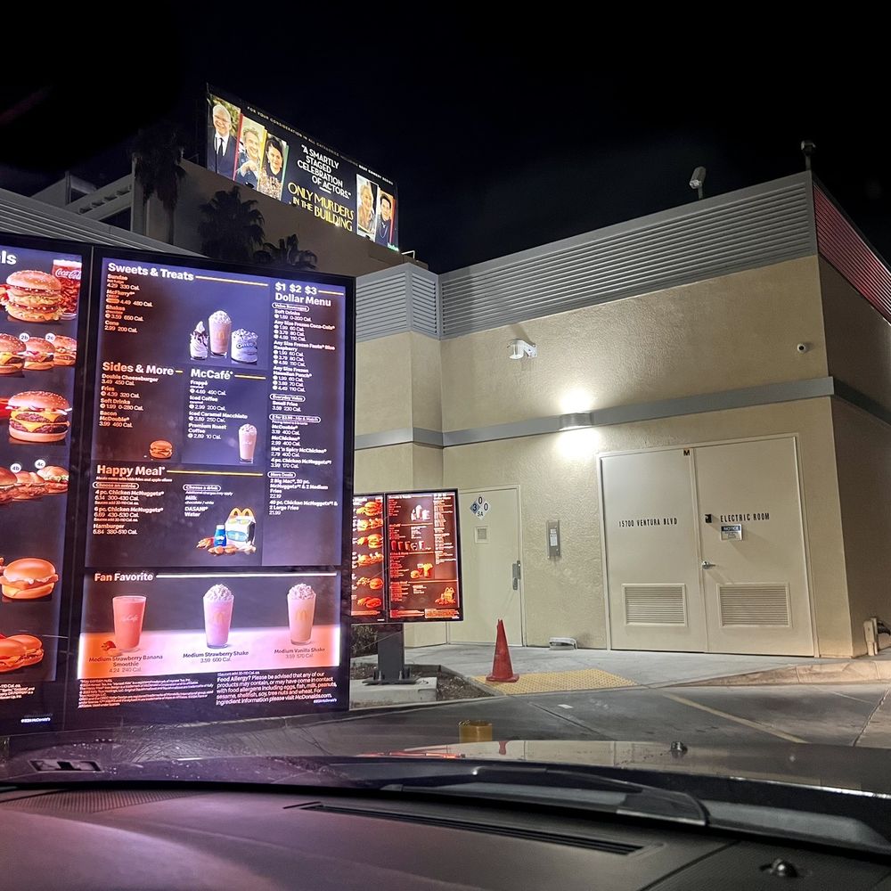 a menu on the front of a restaurant