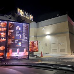 a menu on the front of a restaurant