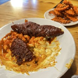 Mac n Cheese with hot Nashville tenders. Mac n Cheese with hot Nashville tenders.