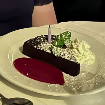 Cafe Bizou - Warm flourless chocolate cake with raspberry coulee - French Near Me - Agoura Hills, California