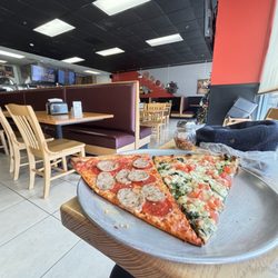 Franco Pizzeria and Restaurant - Yin and Yang in pizza slice form.
